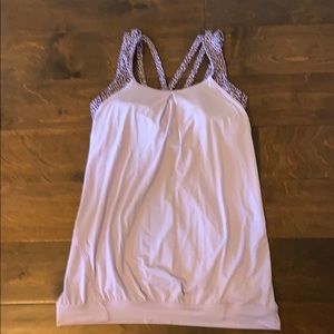 Lululemon tank with sports bra. No size tag.